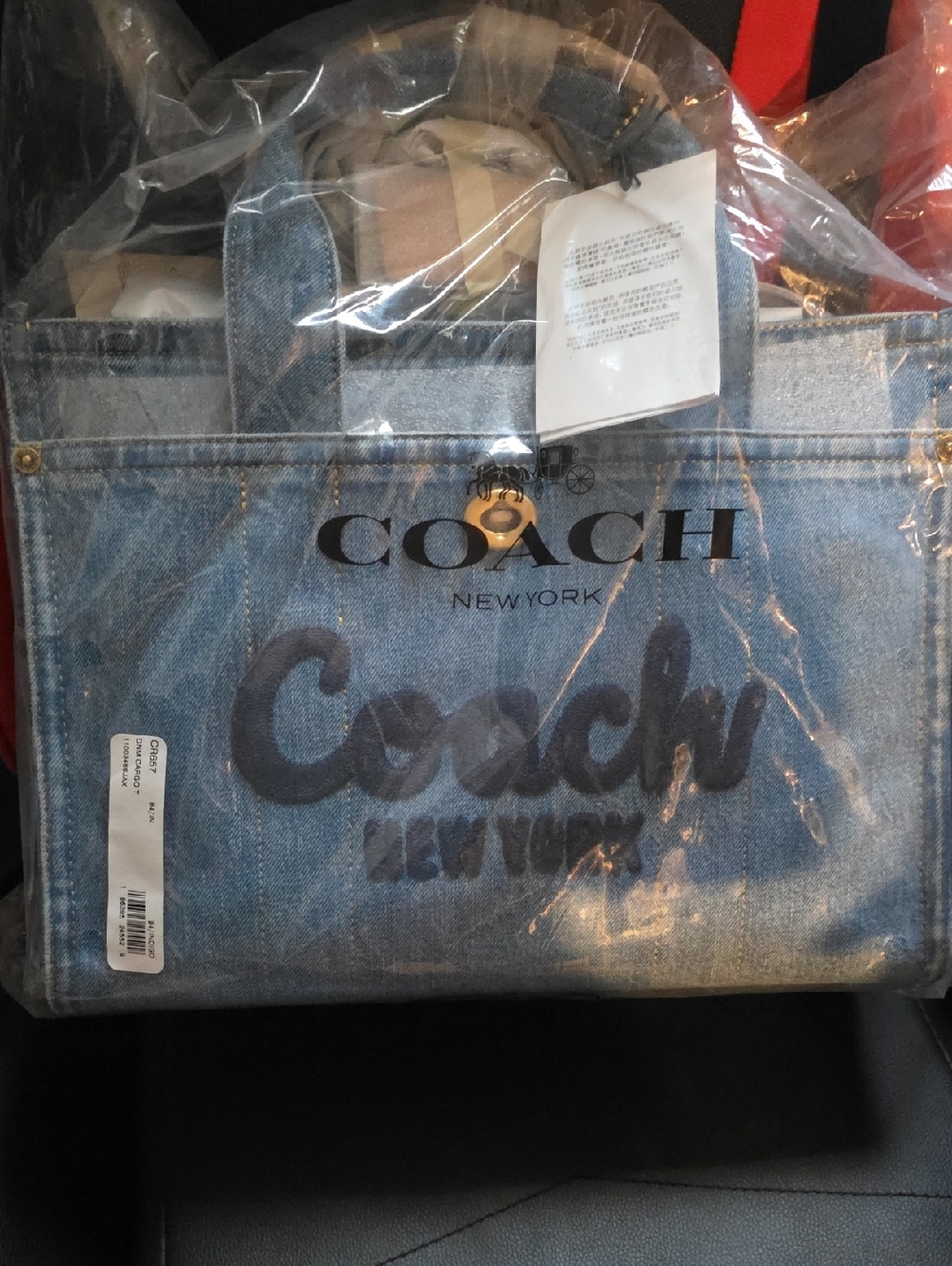Coach Denim Tote in Light Blue with Dark Blue Script Logo